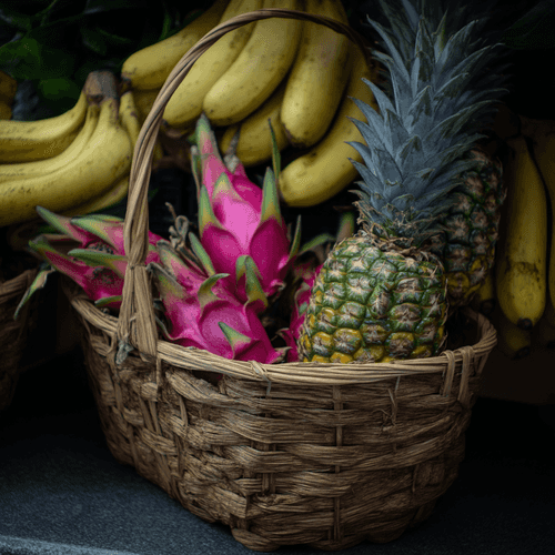 A close photo of a basket of tuber vegetables